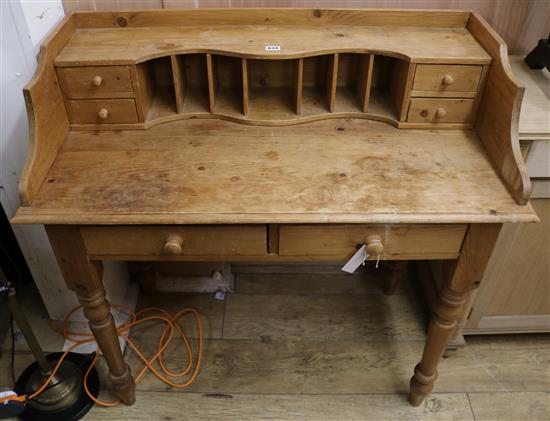 A pine desk W.102cm